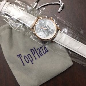 Elephant face watch with white band